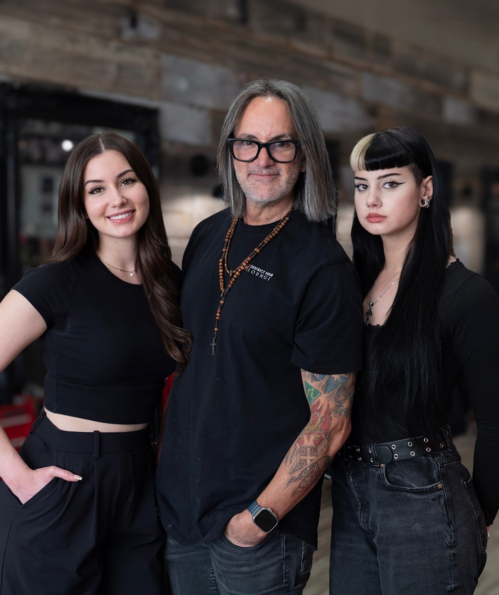 https://districthair.com/wp-content/uploads/2026/07/26178-W-DH-Website_Updates_ourstory_father_daughters_ConB_SD_V1_FINAL.jpg